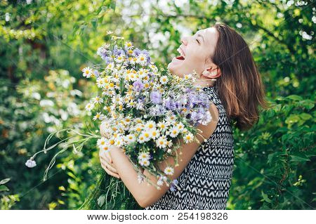 Young Beautiful Woman Girl Hold Big Bouquet Of Wild Field Flowers
