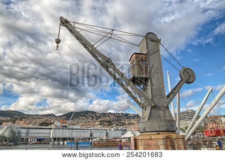 Genoa (genova), Italy, August, 10, 2017 - View Of An Old Industrial Crane In The Ancient Port Of Gen