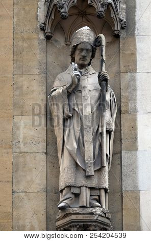 PARIS, FRANCE - JANUARY 05: Saint Remigius, statue on the portal of the Basilica of Saint Clotilde in Paris, France on January 05, 2018.