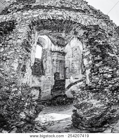 Ruins Of The Castle Gymes In Slovak Republic. Travel Destination. Detailed Scene. Black And White Ph