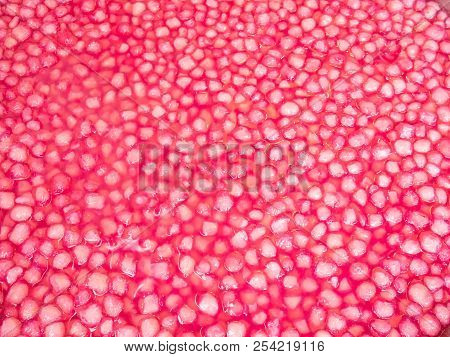 Close Up Pink Mock Pomegranate For Local Thai Dessert In Background.