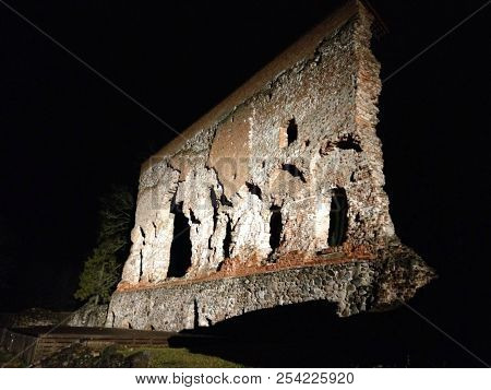 A Brick Castle Wall With Holes At Viljandi Castle Ruins In The Nigttime