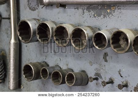 Close-up Shot Of Screwhead In Repair Shop