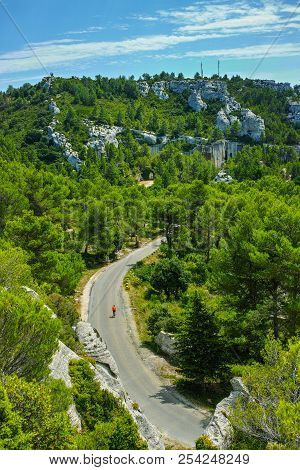 Vacation Tourist Destination In France, Alpilles Mountains Gorge In Provence, Green Pine Forests And