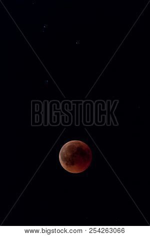 Blood Moon At Most Red Moment In Black Night