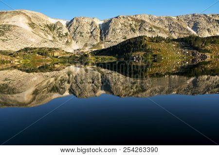 Sugarloaf Mountain And Medicine Bow Peak Reflected In Libby Lake  In Medicine Bow National Forest In