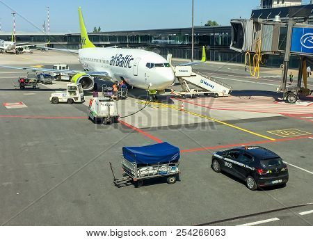 Riga, Latvia - May 5, 2018: Airbaltic Aircraft Preparation For Departure In The Riga International A