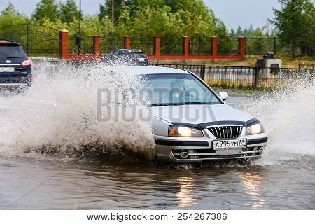 Novyy Urengoy, Russia - August 14, 2018: Motor Car Hyundai Elantra In The City Street During A Heavy