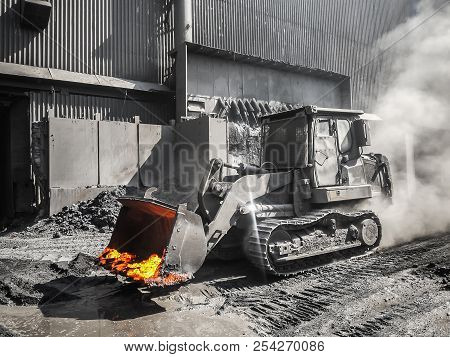Asha, Russia - July 14, 2018: Molten Metal Carrier Liebherr In The City Street Near The Metallurgica