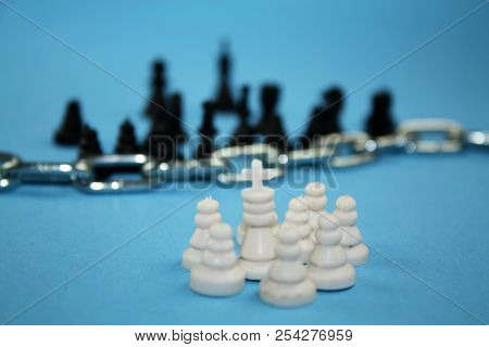 Fear From Refugees Concept Metaphor. Chess Pieces Symbolize Migration, Borders, Christianity And Isl