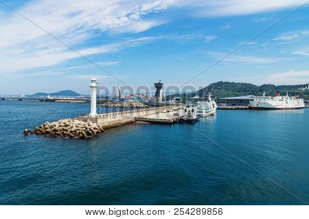 Jeju-si Ferry Terminal Seen From The Sea With Lighthouse, Jeju-si, Jeju Island, South Korea