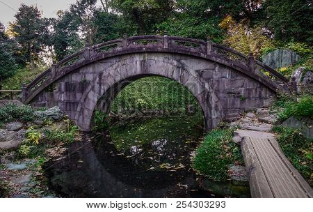 Ancient Stone Bridge At The Park