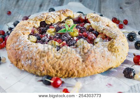 Summer Crostata Or Galette Pie With Fresh Garden Berries