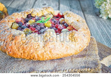 Summer Crostata Or Galette Pie With Fresh Garden Berries