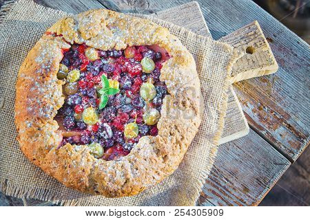 Summer Crostata Or Galette Pie With Fresh Garden Berries