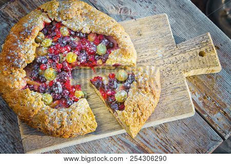 Summer Crostata Or Galette Pie With Fresh Garden Berries