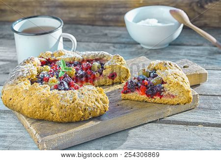Summer Crostata Or Galette Pie With Fresh Garden Berries