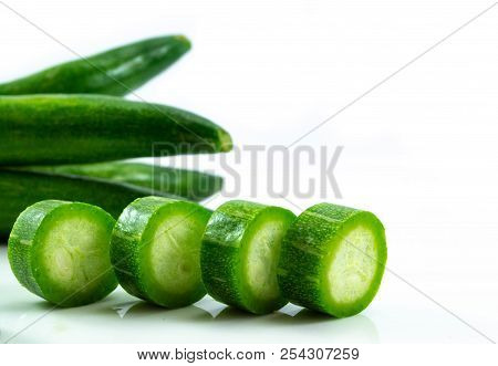 Close Up Snake Gourd Fresh Slice Isolated On White Background
