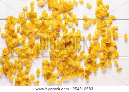 Lot Of Whole Dry Golden Raisins Sultana Variety Flatlay On Grey Wood