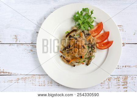 Fried Vermicelli With Mushroom And Dried Shrimps On White Plate
