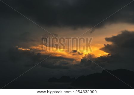 Dark Dramatic Sky During Golden Yellow Sunset On Exotic Island, Thailand