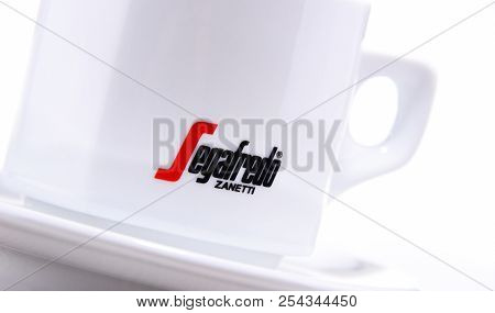 Composition With Cup And Beans Of Segafredo Zanetti Coffee