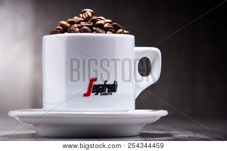 Composition With Cup And Beans Of Segafredo Zanetti Coffee