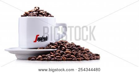 Composition With Cup And Beans Of Segafredo Zanetti Coffee