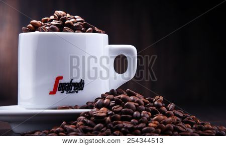 Composition With Cup And Beans Of Segafredo Zanetti Coffee