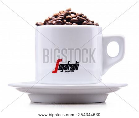 Composition With Cup And Beans Of Segafredo Zanetti Coffee
