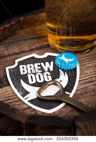 London, Uk - August 10, 2018: Brewdog Beer Coaster With Bottle Top And Opener And Glass Of Beer On T