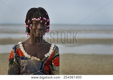 Orango Island, Guinea-bissau - February 2, 2018:  Portrait Of A Beautiful Young Girlr In The Beach I