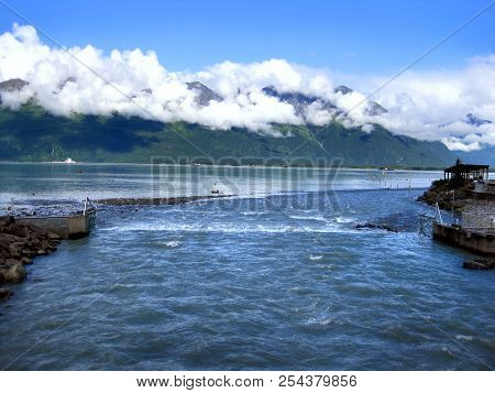 Chugach Mountains Surround The Solomon Gulch Fish Hatchery In Valdez, Alaska.  Water And Fish Channe