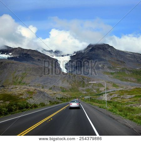 Driver Approaches Worthington Glacier Near Valdez, Alaska.  Glacier Sits Atop The Chugach Mountains.