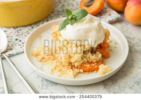 Homemade Apricot Cramble With Ripe Apricot Fruits. Apricot Cramble With Ripe Apricot Fruits