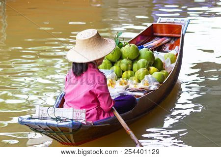 Damnoen Saduak Floating Market, Thailand Small Boats Laden With Colourful Fruits And Vegetables And 