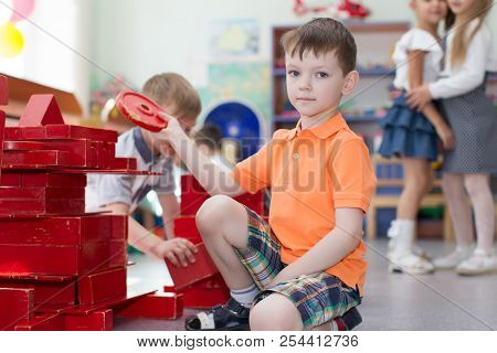 Belarus, Gomel, May 29, 2018. The Kindergarten Is Central. Open Day.the Boy Plays The Designer. The 