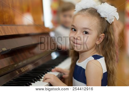 Belarus, Gomel, May 29, 2018. The Kindergarten Is Central. Open Day.child Plays The Piano.preschool 