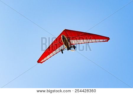Flight Of The Motor Deltaplane In The Sky.