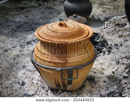 Cabbage In Earthen Pot On Coal In The Street, Trumpet Festival Guca, Serbia.