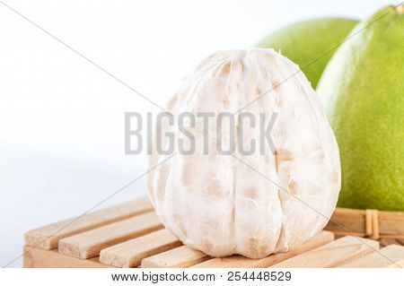 Fresh And Peeled Pomelo(shaddock), Grapefruit With Slices Isolated On White Background