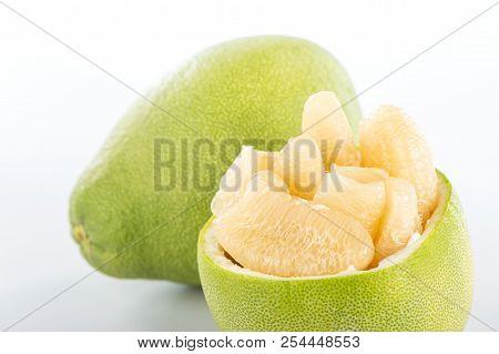 Fresh And Peeled Pomelo(shaddock), Grapefruit With Slices Isolated On White Background