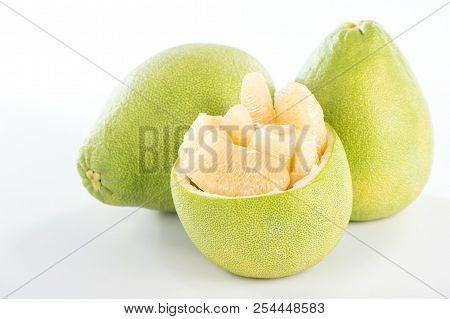 Fresh And Peeled Pomelo(shaddock), Grapefruit With Slices Isolated On White Background
