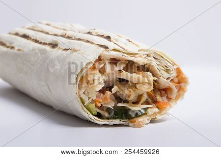 Shaverma On A White Background. Doner Kebab. Delicious Juicy Shawarma