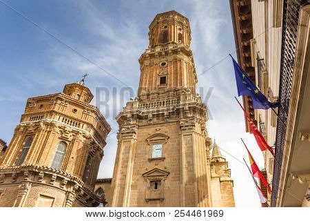 Cathedral Tower And Flags In The Historic Center Of Tudela, Spain