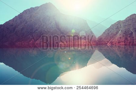 Beautiful serene lake in  Fann mountains (branch of Pamir) in Tajikistan.