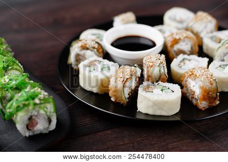 Japanese Restaurant Menu, Professional Culinary, Traditional Meals. Delicious Sushi Rolls With Eel, 