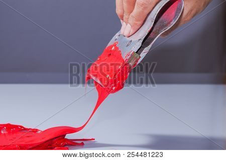Red Color Of Plastisol Ink On White Background. Plastisol Ink Use For Screen Print 
On Tee Shirt And