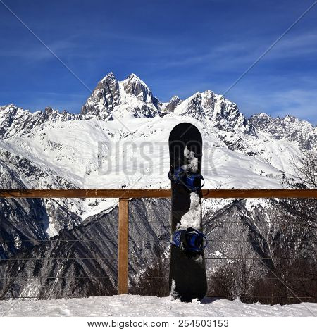 Snowboards In Outdoor Cafe At Ski Resort At Sun Winter Day. Mount Ushba, Caucasus Mountains. Svaneti