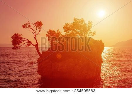 Croatia Brela, Adriatic Sea And Famous Brela Rock, Dalmatia At Summer, Sunset